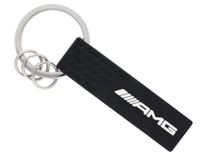 AMG key ring. Black/white, Plastic/stainless steel. Large split ring with Mercedes-AMG laser finish. Three additional mini split rings for the quick removal/replacement of individual keys. Length approx. 8 cm.