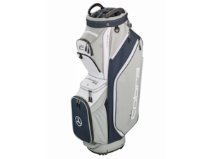 Golf cart bag, Ultralight Pro. Grey/navy. 100% polyester. 14-fold roof partition, 4 continuous separations down to the floor. 2 clothing pockets. Insulated cool compartment. 2 open mesh pockets for drinks. Padded carrying strap, carrying handle on the back, adjustable shoulder strap, 2 lift handles integrated into the top. Towel ring. Made for Mercedes-Benz by COBRA PUMA GOLF. Dimensions approx. 41 x 27 x 92 cm, weight approx. 2.7 kg.