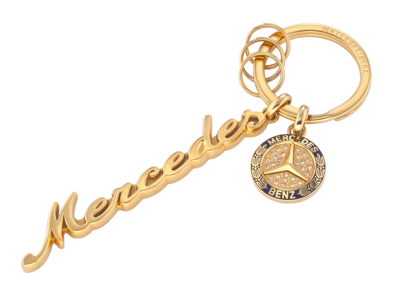 Mercedes Classic lettering key ring. Stainless steel. Flat split ring with three additional mini split rings for quick removal/replacement of individual keys. Length approx. 11 cm. Gold-coloured/blue B6 604 1518. Silver-coloured/blue B6 604 1675.