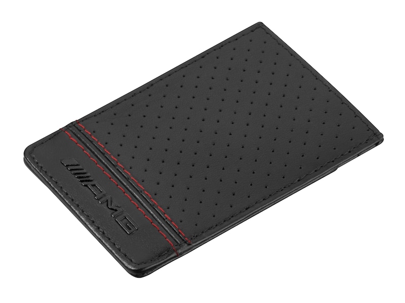 Credit card holder with money clip. Black with red contrasts. Combination of grained and perforated leather. Stainless steel money clip. AMG inner lining. Handmade in Germany. Dimensions approx. 6.5 x 0.5 x 10 cm.