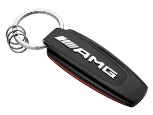 AMG Typo key ring. Silver/black/red. Stainless steel/carbon fibre. Flat split ring with three additional mini split rings for quick removal/replacement of individual keys. AMG logo on front. Designed in Germany. Length approx. 9 cm.