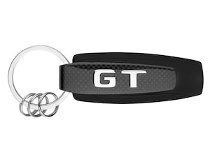 Mercedes-AMG GT Typo key ring. Silver/black/yellow. Stainless steel/carbon fibre. Flat split ring with three additional mini split rings for quick removal/replacement of individual keys. Front features replica of "GT" lettering on rear of vehicle, back features AMG logo. Designed in Germany. Length approx. 9 cm.