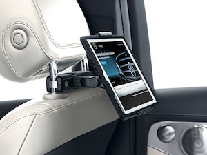 Infinitely adjustable holder, suitable for popular Apple and Samsung tablets.<br/>Rotates 360° for horizontal or vertical use. Tilts vertically to allow optimal positioning for users of different heights.<br/>Simple to fit to the head restraint - the holder is inserted into an adapter, which must be purchased separately. Can only be used in conjunction with a separately available Mercedes-Benz safety case.